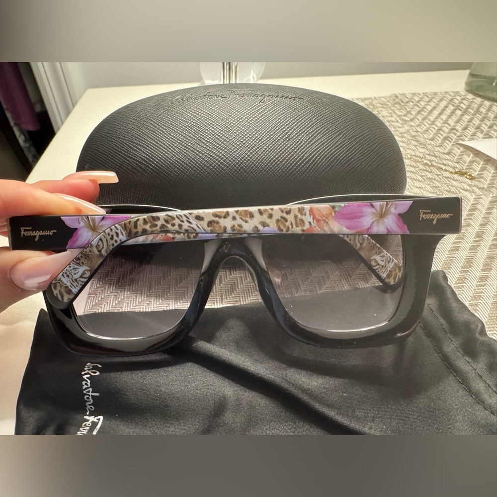 Ferragamo sunglasses never worn, brand new. Come with case and box.